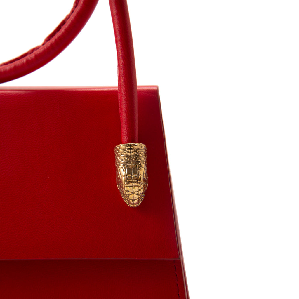 Luxury Italian Leather Red Handbag with Metal Snake Accent Details